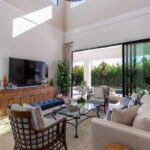 3096 blue Cypress main living exiting to exterior patio